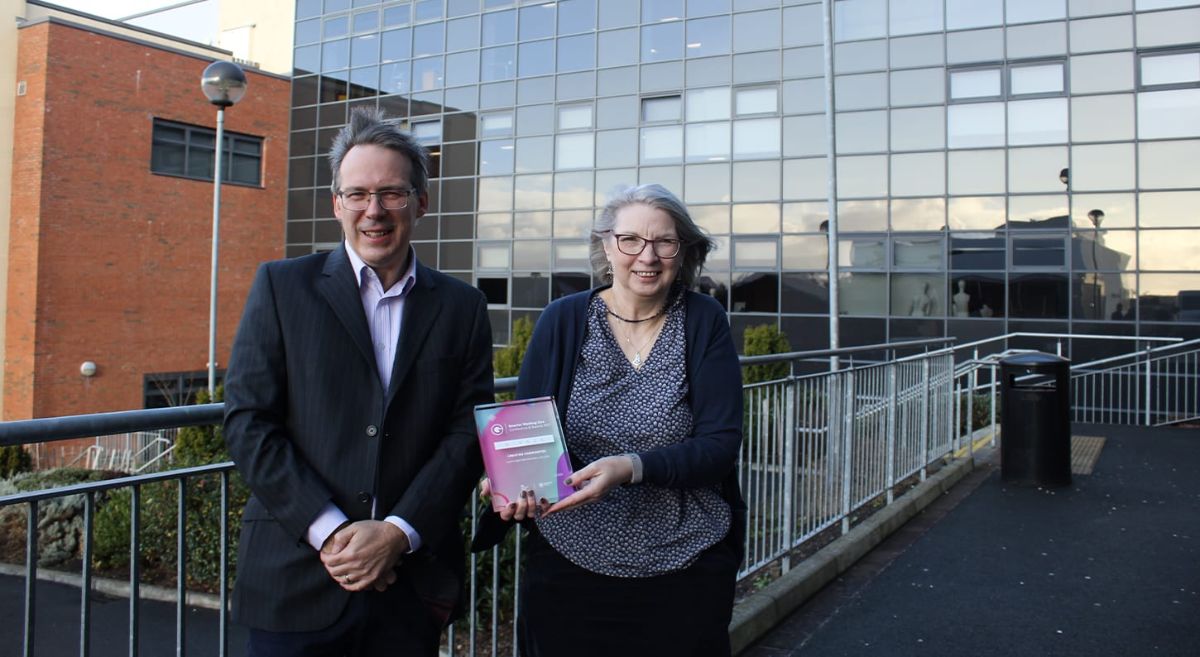 SERC's Paul Walsh and Ellie Bradley pictured outside Downpatrick Campus with Smarter Working Live Award plaque.